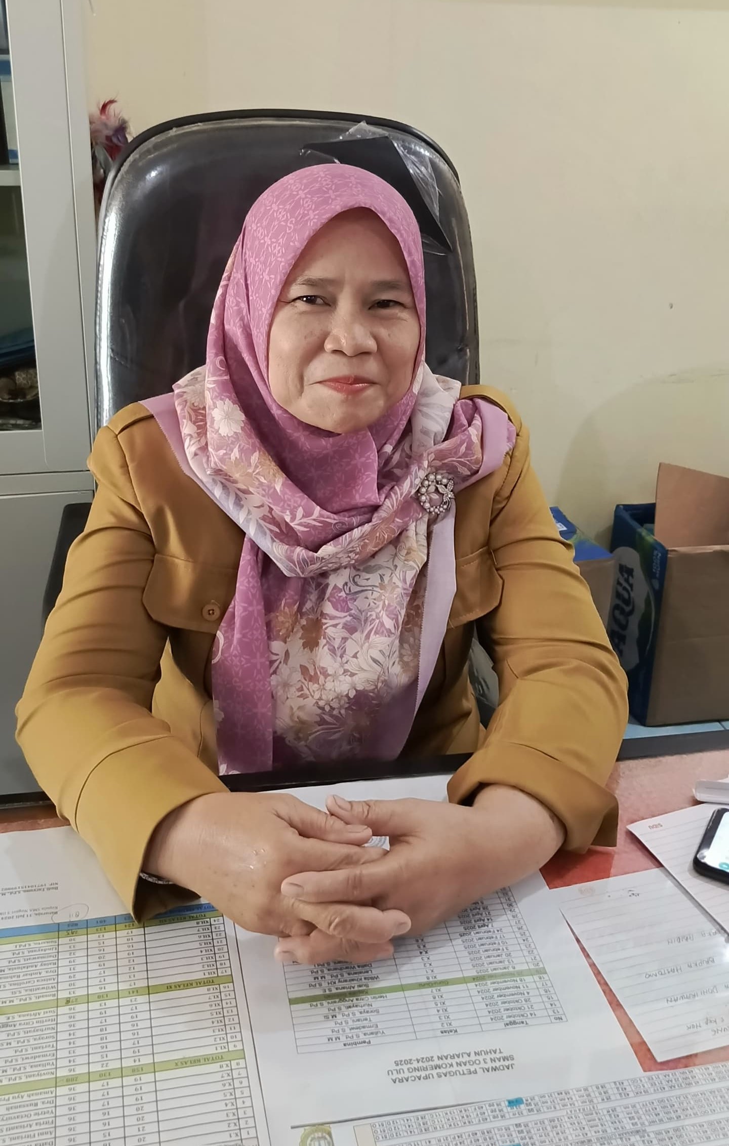 Dewi Asnita, S. Ag.